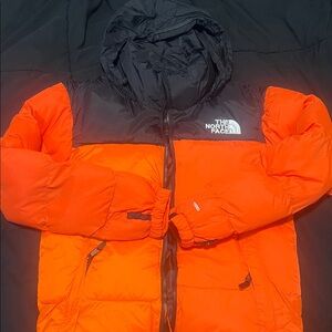 The North Face Orange and Black Coat